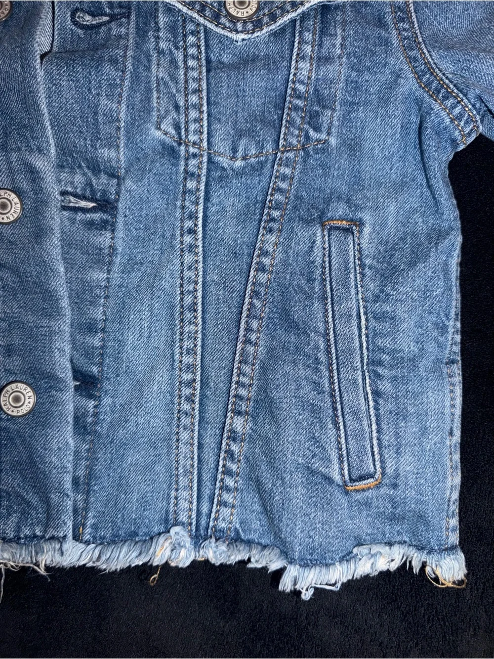 Ralph Lauren Polo Light Blue Denim distressed Jacket. Polo print on the back.